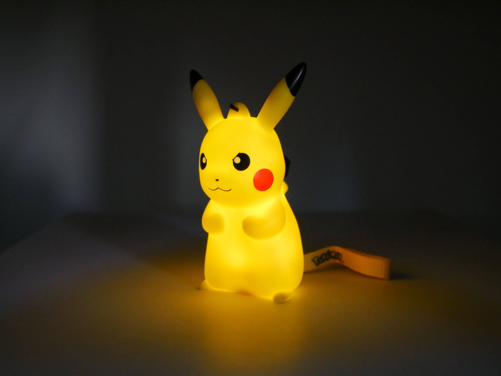 Light-Up Figurine Pokémon Pikachu Grumpy with handstrap EVORETRO Canada Figurine Light up  Squirtle Squad Card Shop.