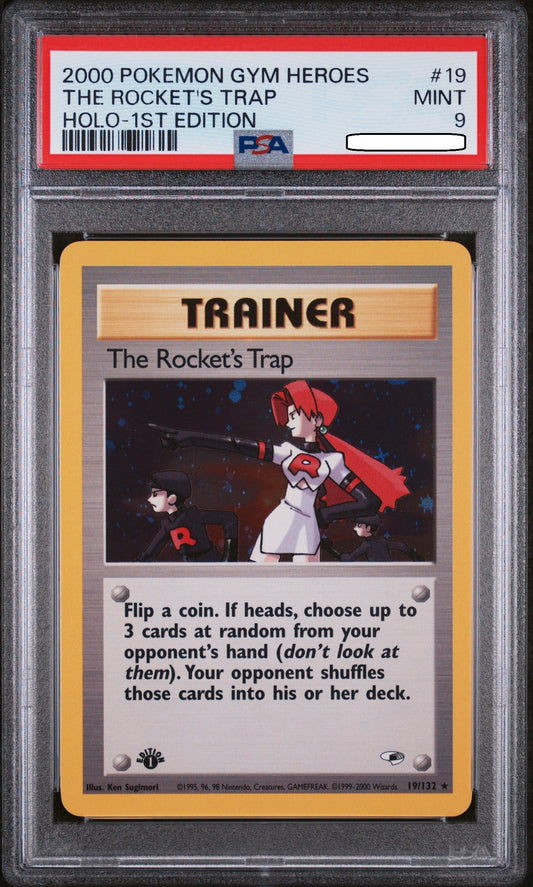 Pokémon TCG – The Rocket’s Trap Holo 1st Edition 19/132 – Gym Heroes – PSA 9 Mint Squirtle Squad Card Shop.   Squirtle Squad Card Shop.